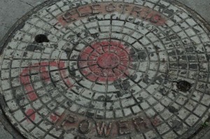 man hole cover in the street